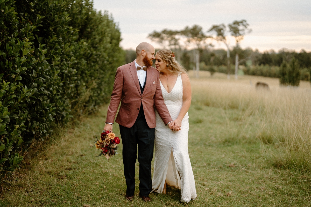 a lovely couple married at their south coast backyard wedding